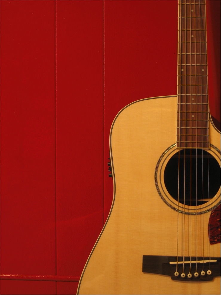 Guitar and Red Wall