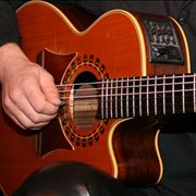 Playing on Acoustic Guitar